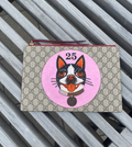 Gucci GG Supreme Bosco clutch – Boston terrier
