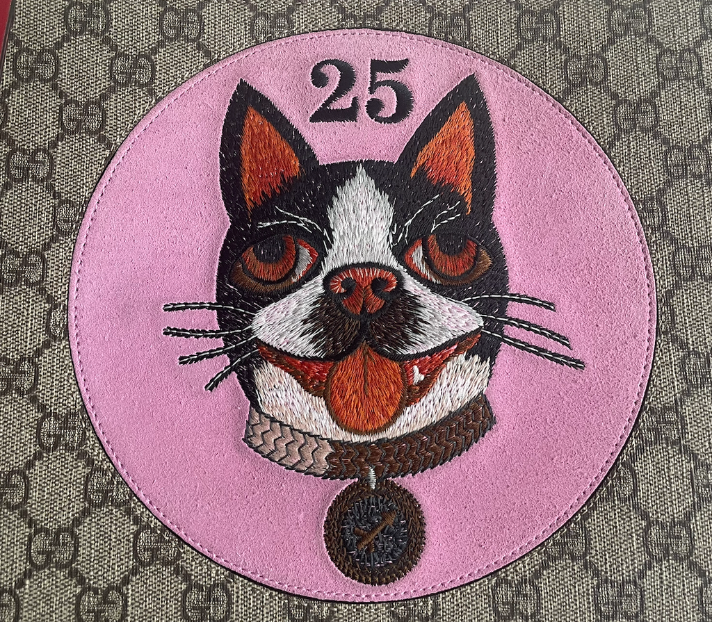 Gucci GG Supreme Bosco clutch – Boston terrier
